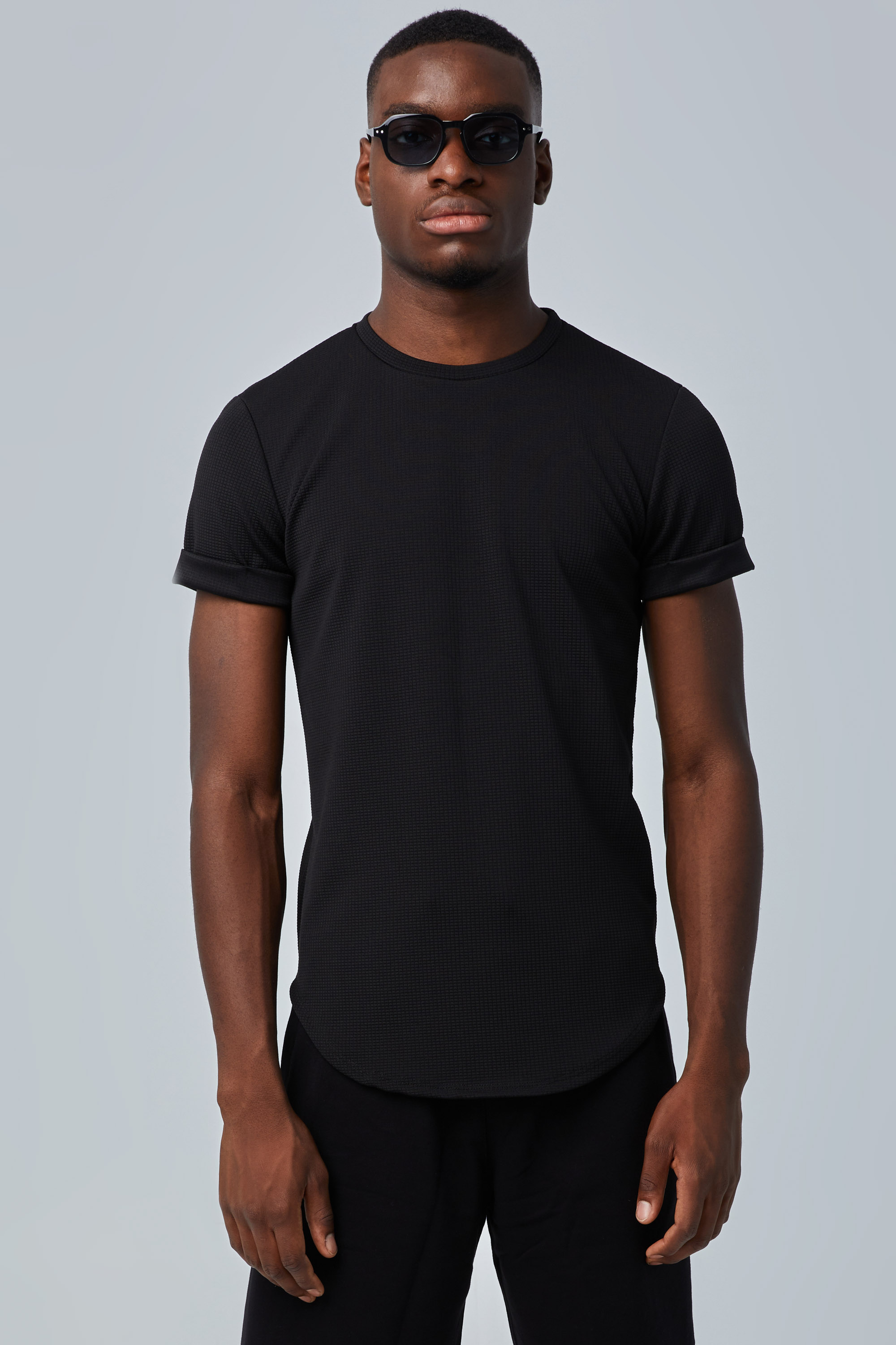 Textured Black T-Shirt With Rolled-Up Sleeves | Aristoteli Bitsiani