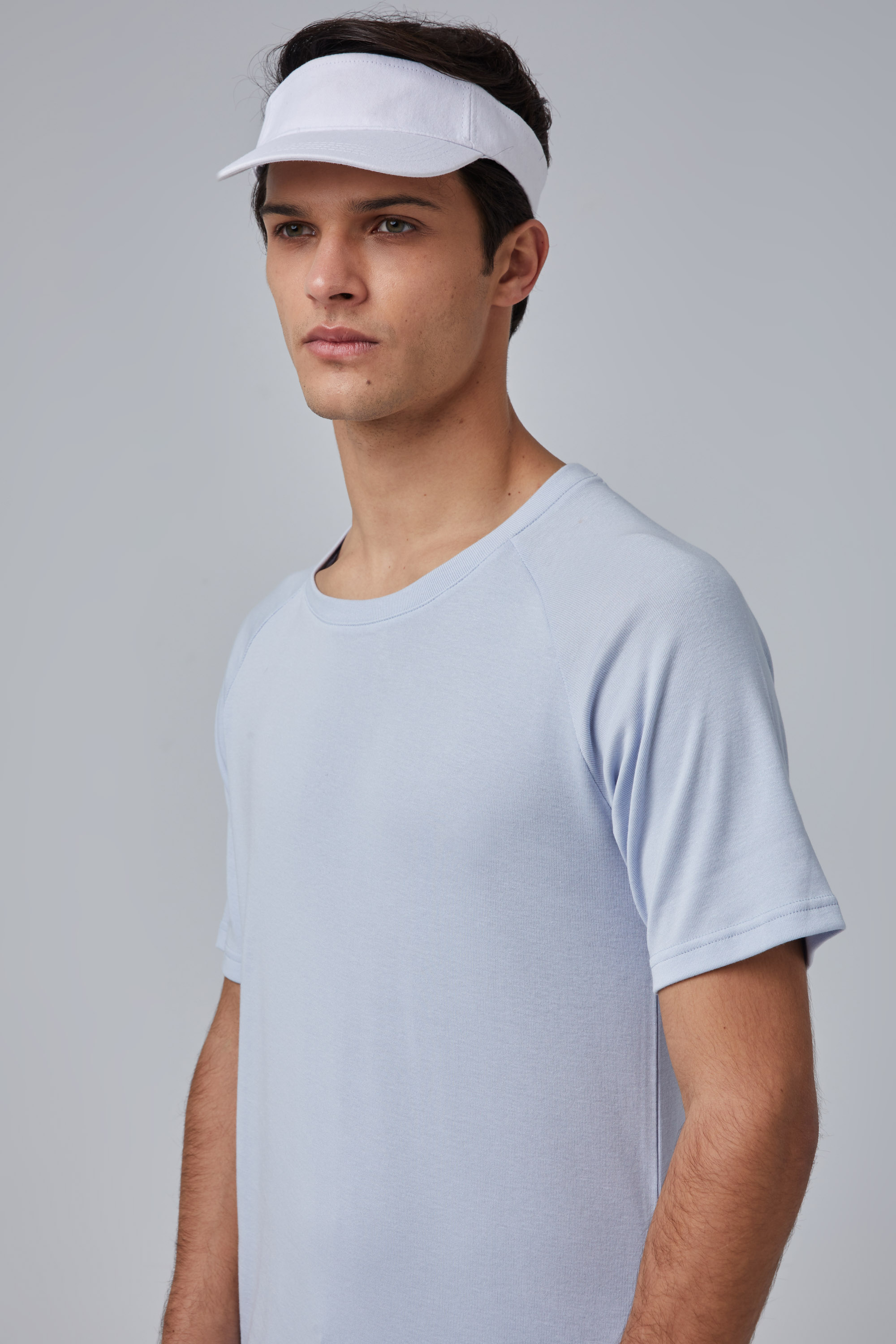 Light Blue T-Shirt In Raglan Sleeves With Curved Hem | Aristoteli Bitsiani